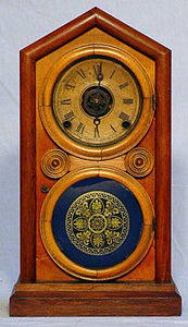 KIRTLAND H. CRUMP - rosewood and mahogany doric mantel clock - Desk Clock