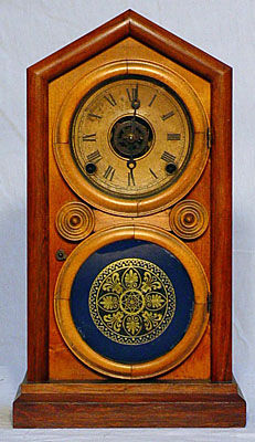 KIRTLAND H. CRUMP - Reloj de apoyo-KIRTLAND H. CRUMP-Rosewood and mahogany Doric mantel clock